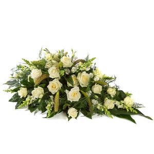 Traditioneel wit rouwbloemstuk, afscheidsbloement