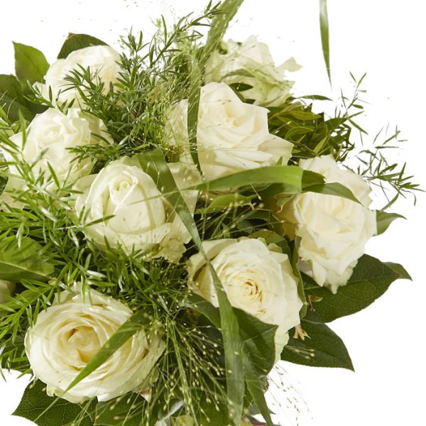 Order a bouquet of white roses with a variety of greenery